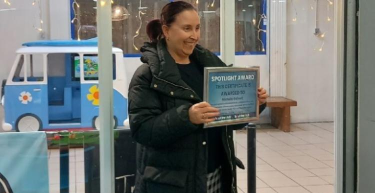 Michelle receiving her award